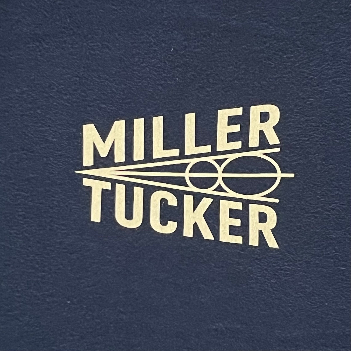 Miller and Tucker, Inc. T-Shirt